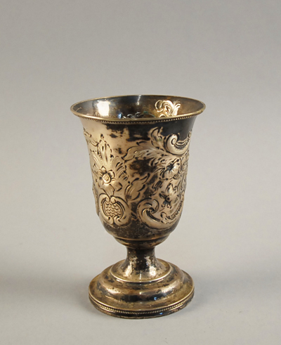 Appraisal: A Coin Silver Goblet with a rococo repousse design marked