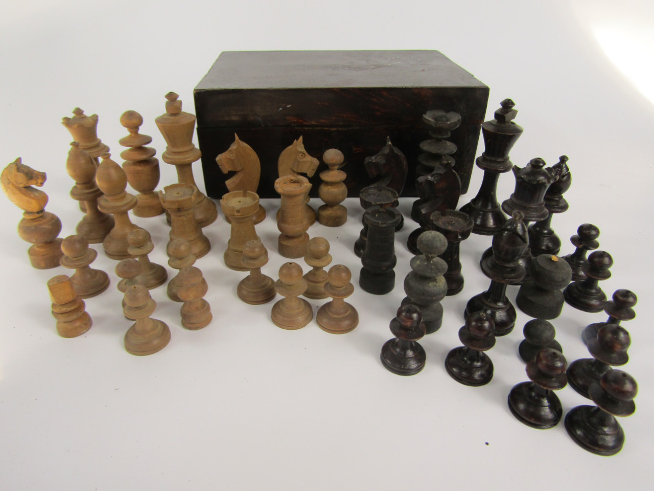 Appraisal: A Staunton type wooden chess set boxed with spare chess