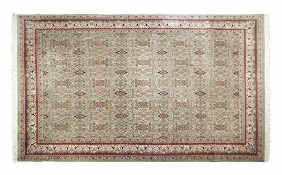 Appraisal: A Indian Wool Carpet having all over stylized foliate decoration