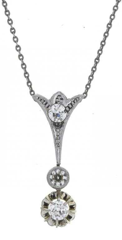 Appraisal: A DIAMOND PENDANT with claw and collet set diamonds suspended