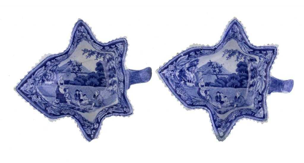 Appraisal: TWO BLUE PRINTED EARTHENWARE HOSPITALITY PATTERN PICKLE DISHES of vine