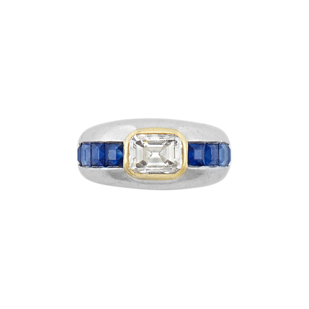 Appraisal: Platinum Gold Diamond and Sapphire Gypsy Ring One emerald-cut diamond