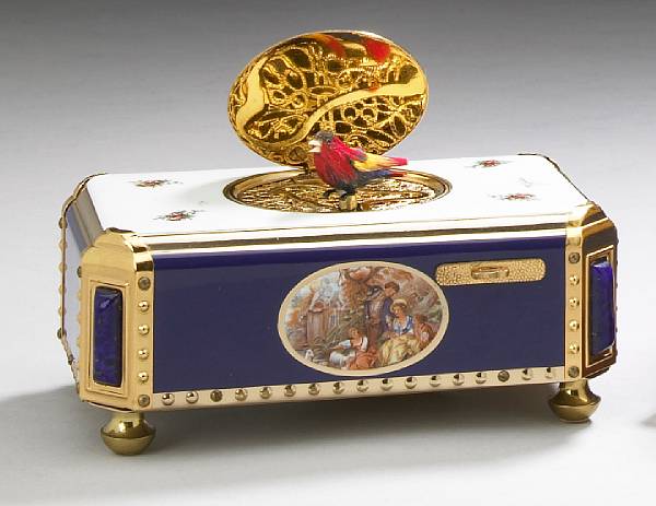 Appraisal: A German gilt metal and enamel singing bird music box