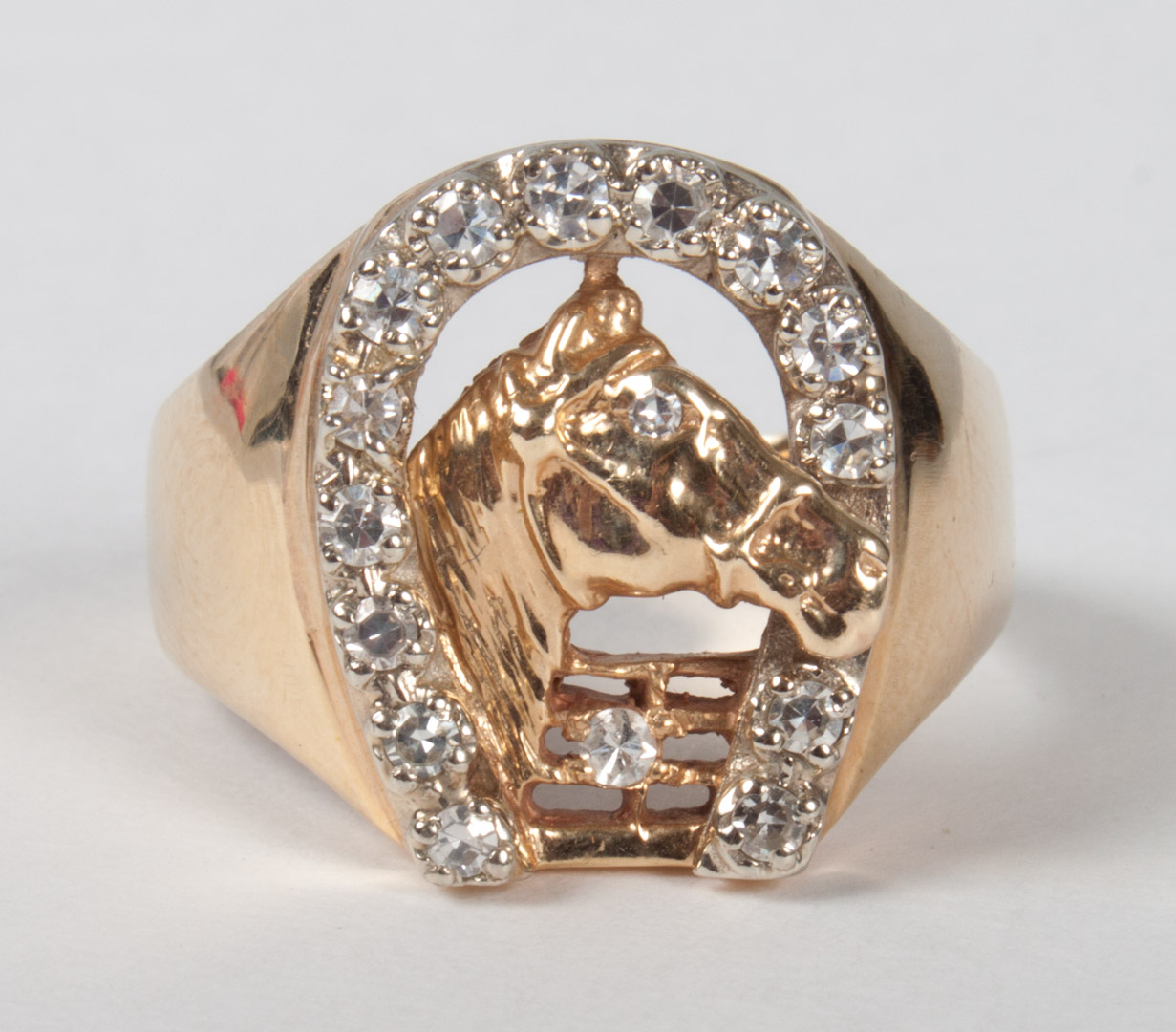 Appraisal: Gentleman's gold and diamond horse ring horse head inside a