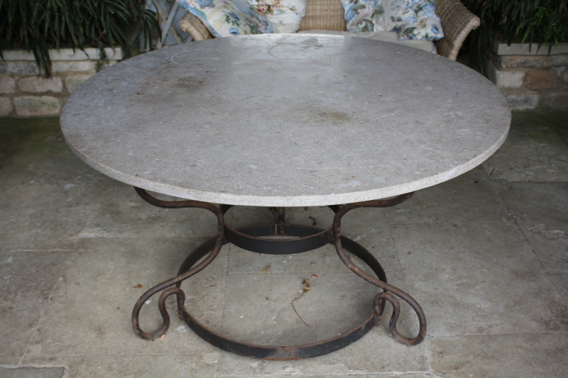 Appraisal: A wrought iron patio table with marble top cm dia