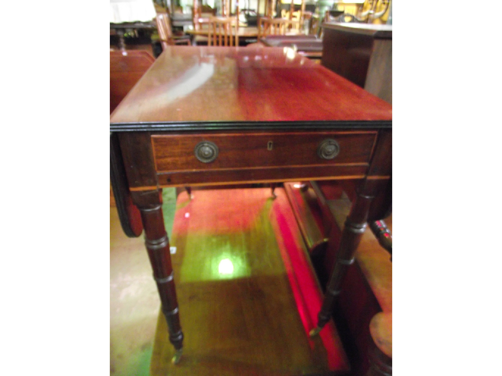 Appraisal: An early th century mahogany Pembroke table with inlaid detail