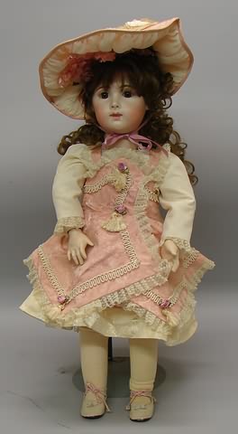 Appraisal: Closed mouth doll by Sally Beatty Brown eyes very curly