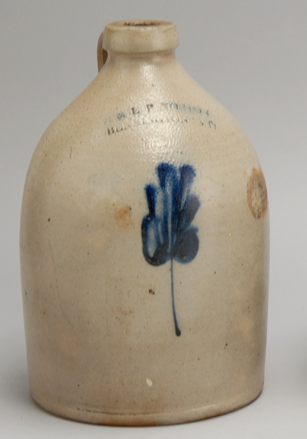 Appraisal: STONEWARE HANDLED JUG th CenturyWith cobalt floral decoration Marked E