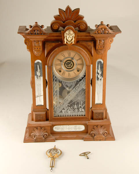 Appraisal: Gilbert Mirrorside Clock day time and strike with alarm H