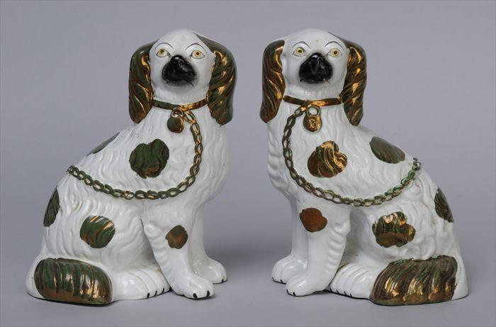 Appraisal: PAIR OF STAFFORDSHIRE SPANIEL FIGURES x in