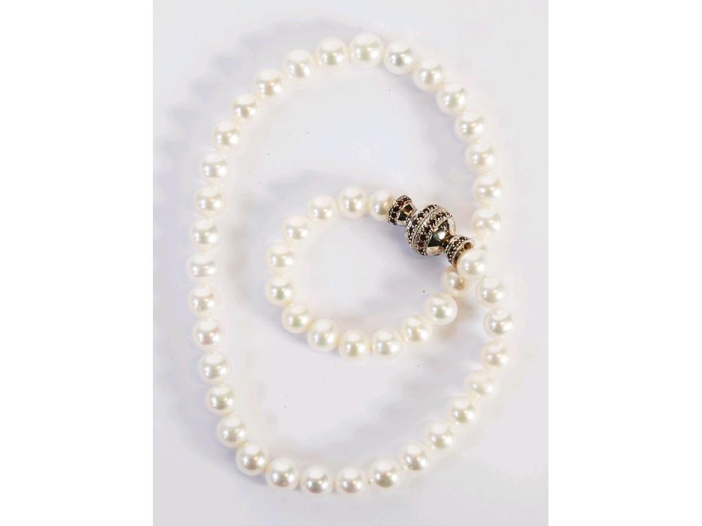 Appraisal: CHINESE CULTURED PEARL SINGLE STRAND NECKLACE with mm uniform pearls