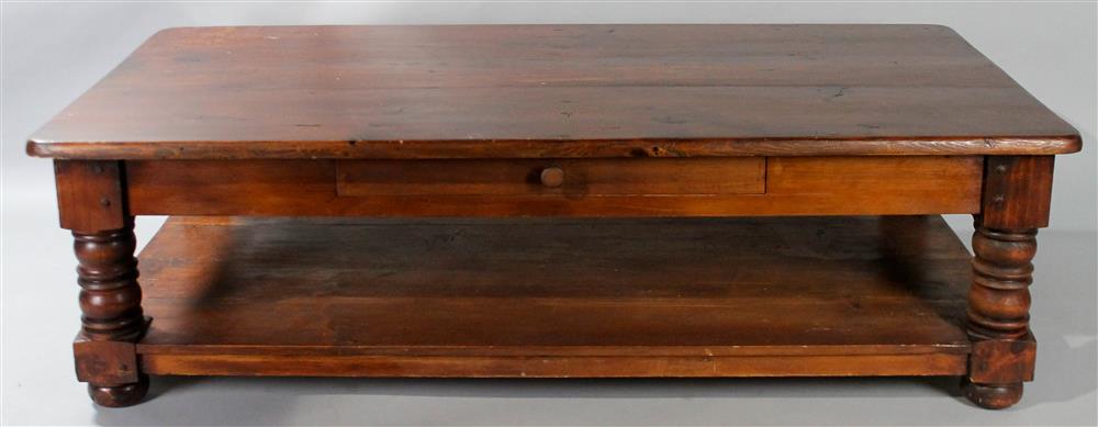 Appraisal: PINE COFFEE TABLE having a rectangular top with molded edges