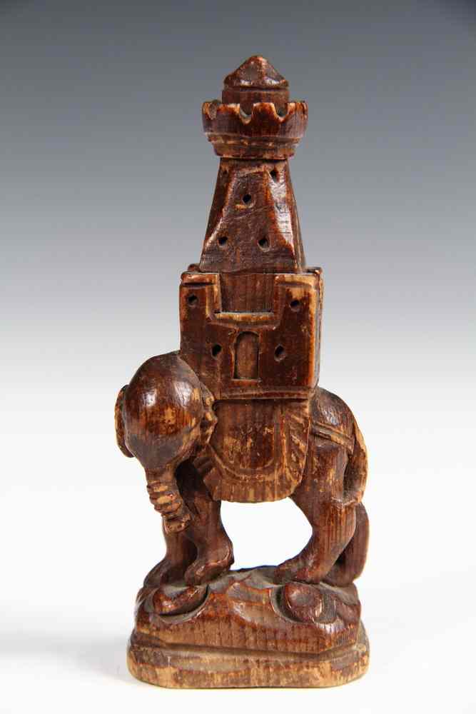 Appraisal: EARLY CHESS PIECE-in the form of an fancifully conceived Indian