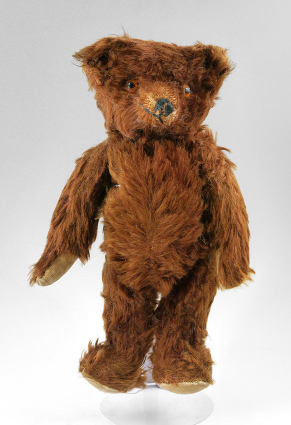 Appraisal: UNUSUAL GERMAN MOHAIR TEDDY BEAR A rare smirking grin bear