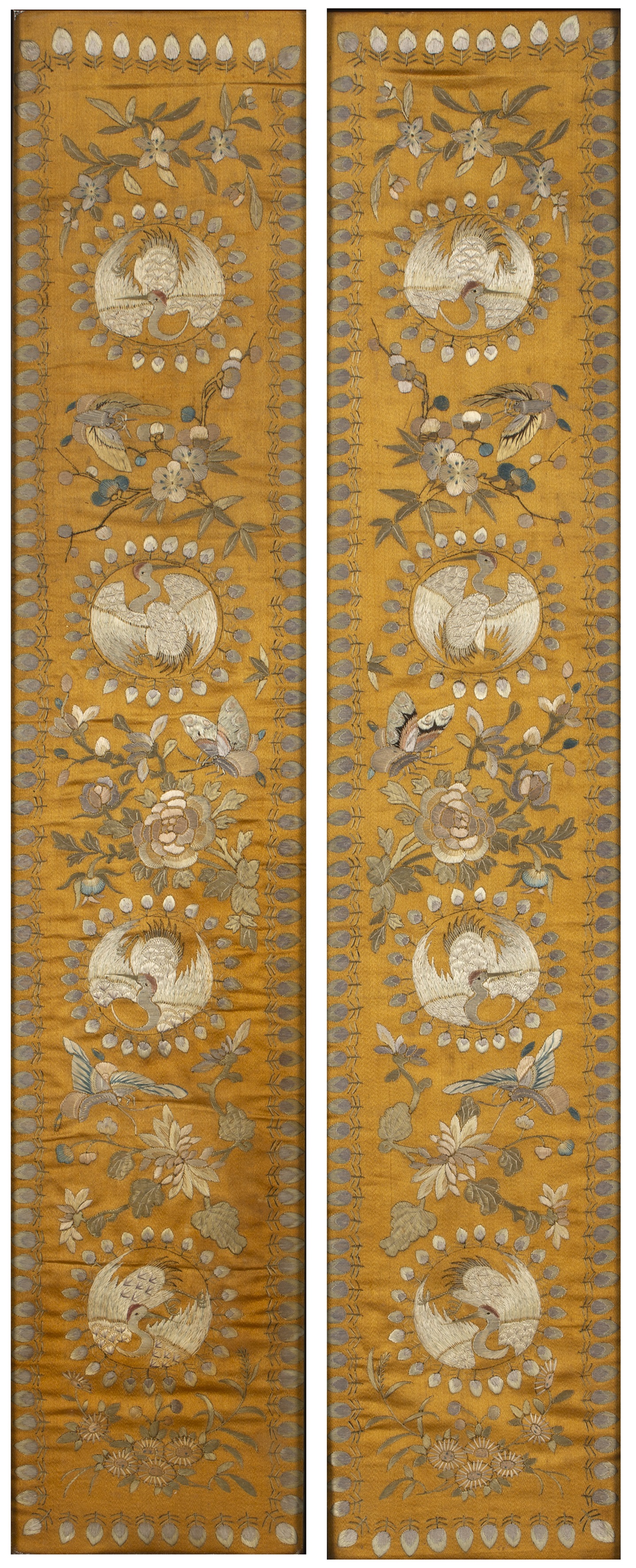 Appraisal: Pair of sleeve bandsChinese th Century worked in coloured threads