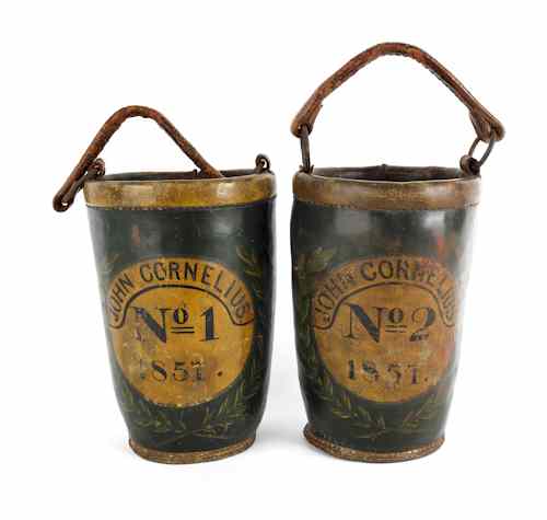 Appraisal: Pair of painted leather fire buckets inscribed John Cornelius Mo