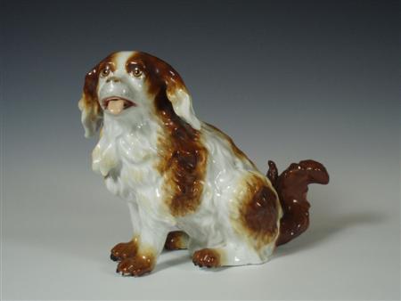 Appraisal: A th century Pirkenhammer Austria porcelain dog in a sitting