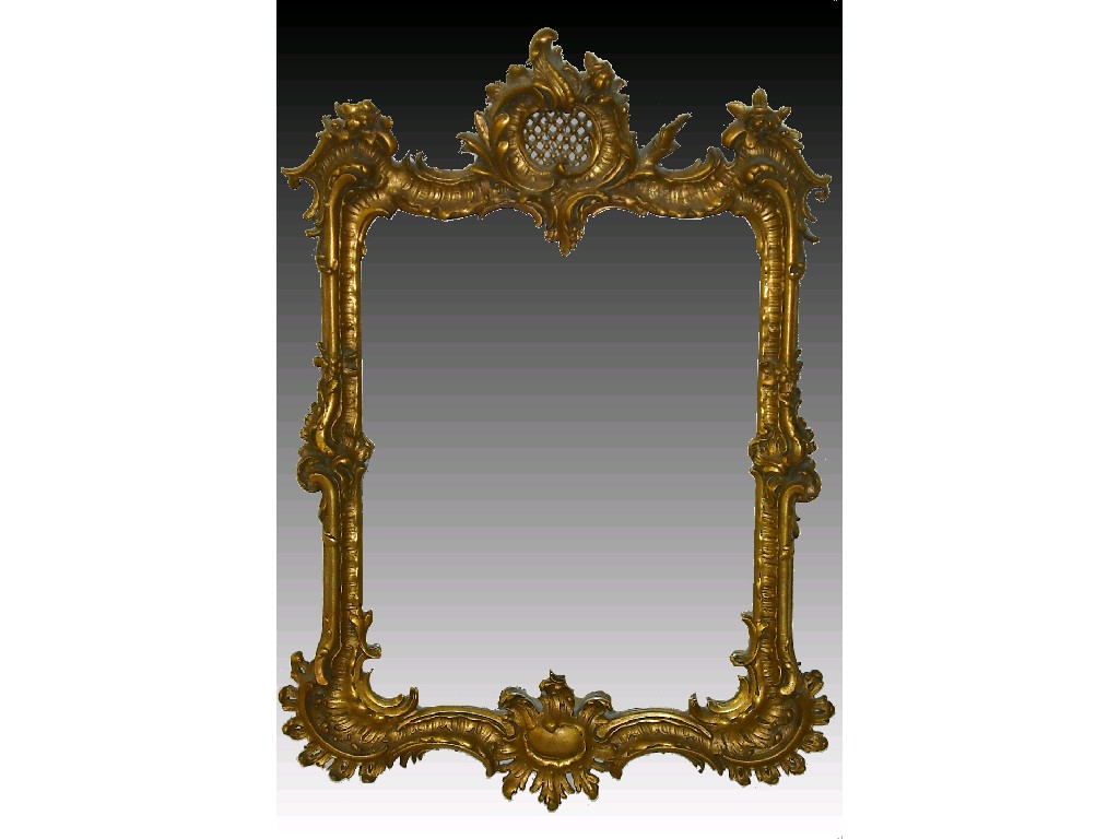 Appraisal: Ornate giltwood and gesso framed wall mirror with foliate scroll