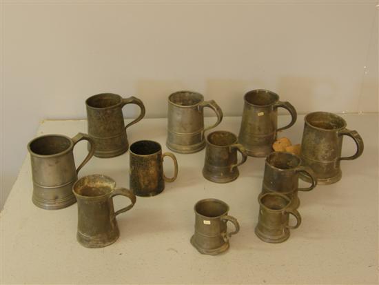 Appraisal: Eleven th century and later pewter mugs various sizes and