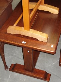 Appraisal: A contempory stained oak refectory table together with a dumb