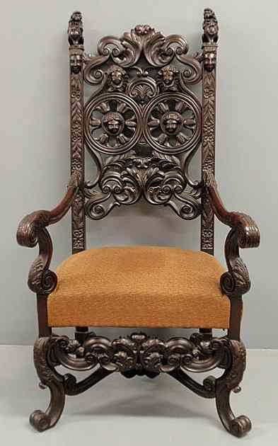 Appraisal: Finely carved Jacobean style ebonized open armchair with lion and