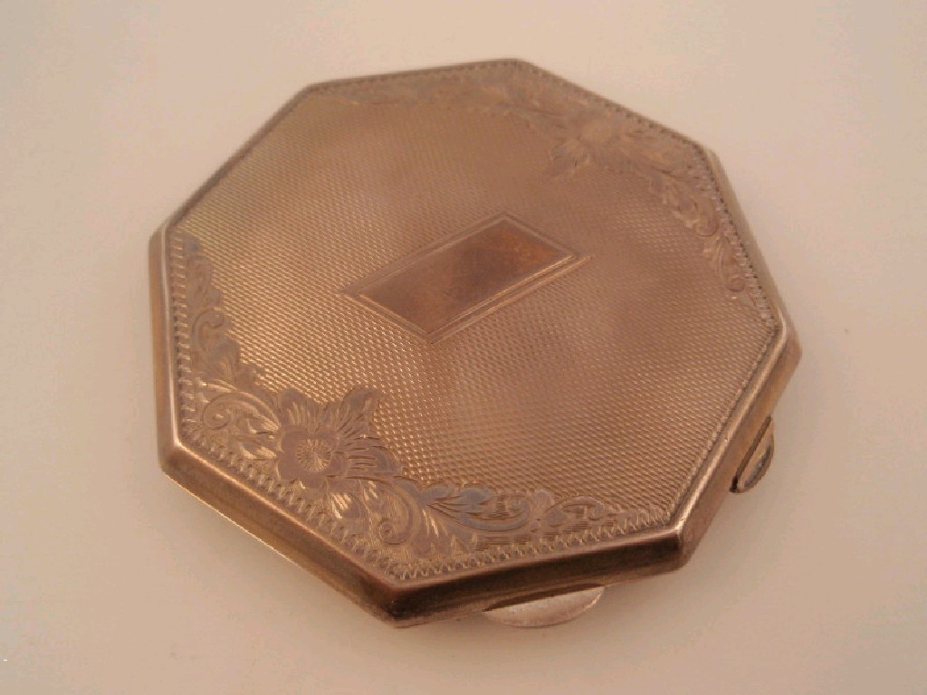 Appraisal: An engine turned octagonal silver powder compact Maker Broadway Co