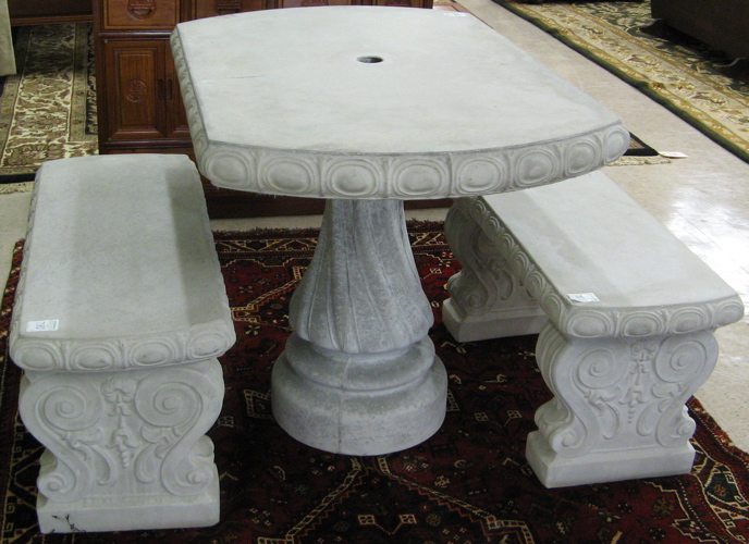 Appraisal: THREE-PIECE CAST CONCRETE GARDEN TABLE AND BENCH SET The table