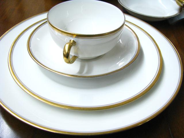 Appraisal: Theodore Haviland Limoges china solid gold rim pattern including eight