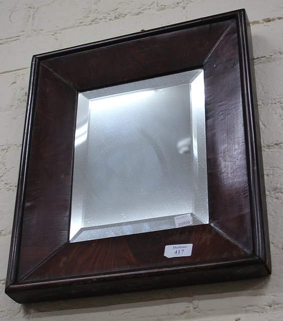 Appraisal: A TH CENTURY ROSEWOOD WALL MIRROR with deep frame and