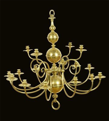 Appraisal: A Dutch brass sixteen light chandelier the baluster and globe