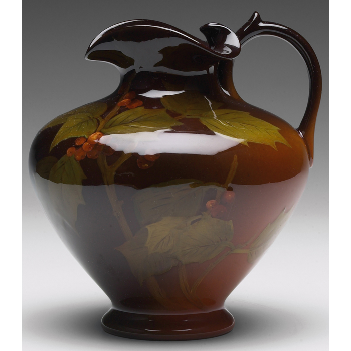 Appraisal: Rookwood handled vessel Standard glaze with a leaf and berry