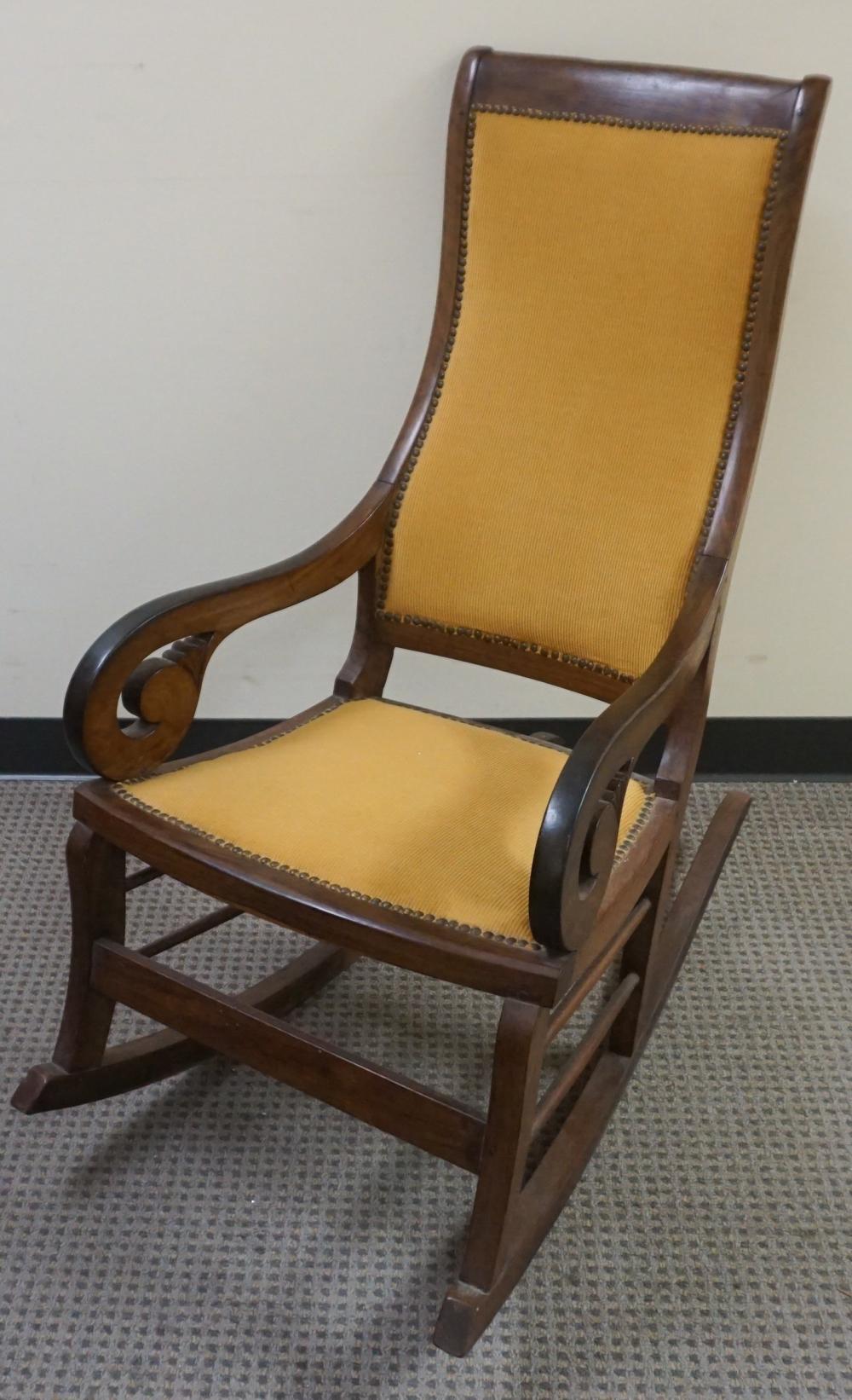 Appraisal: Carved Rosewood and Upholstered Arm Rocker