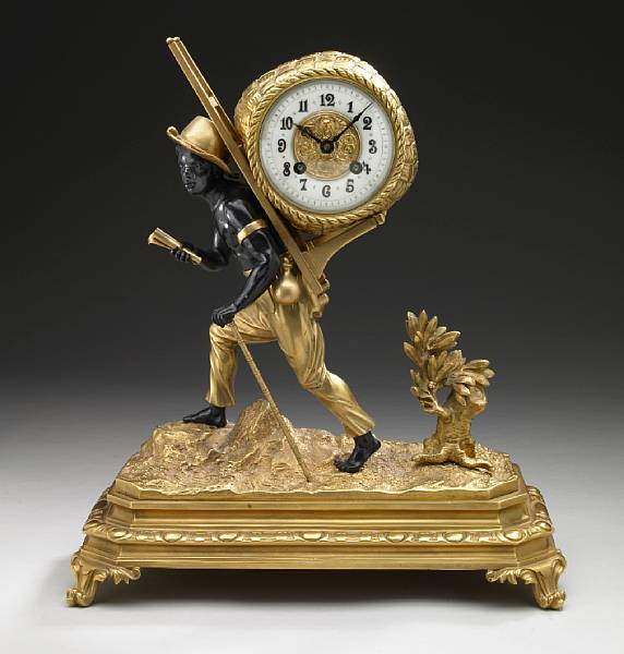 Appraisal: A French patinated and gilt bronze figural mantel clock early