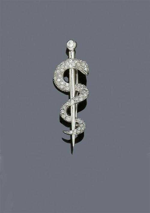 Appraisal: DIAMOND BROOCH CORALIE New York White gold Very decorative small