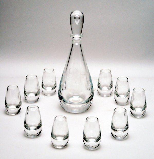 Appraisal: Steuben decanter set teardrop shaped decanter with etched monogram of