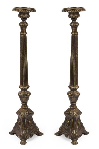 Appraisal: Four Italian style cast iron prickets height in width in