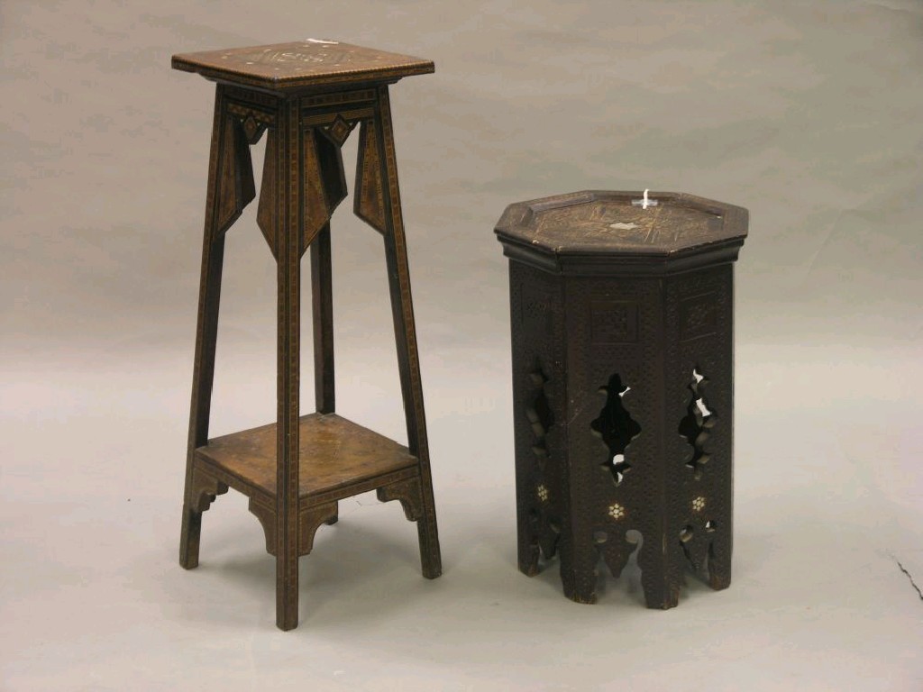 Appraisal: Two eastern inlaid occasional tables one octagonal with carved detail