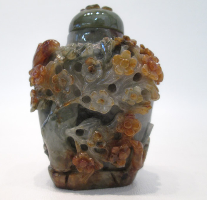 Appraisal: CHINESE CARVED JADE SNUFF BOTTLE with relief bird and floral