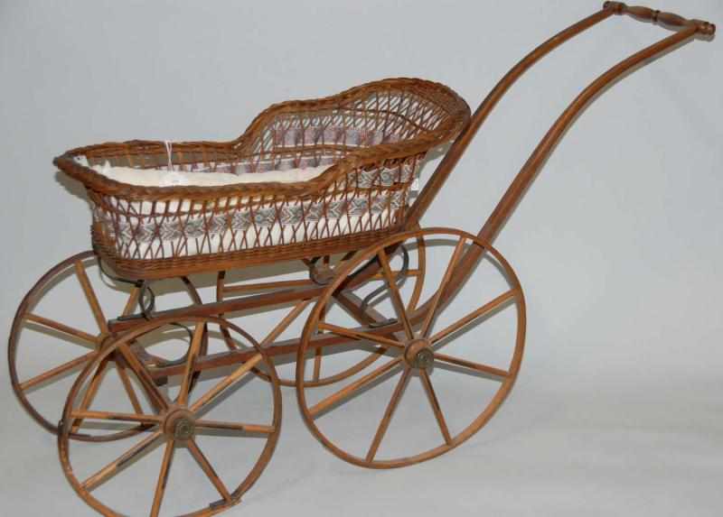 Appraisal: Doll Wicker Baby Carriage Wooden wheels Circa Condition Excellent Size