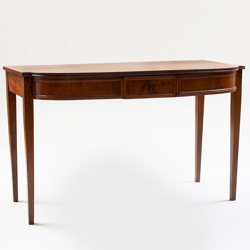 Appraisal: George III Mahogany Serving Table The bow-fronted top fitted with