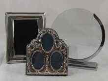 Appraisal: An Art Deco circular rimless photo frame in chromium plated