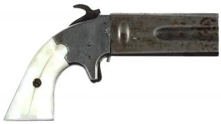 Appraisal: Unidentified two-barrel over under pistol approximately caliber with white plastic