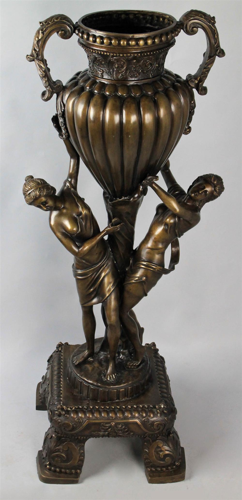 Appraisal: CLASSICAL URN FLANKED BY FEMALE FIGURES h w in