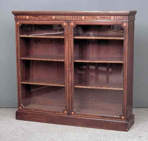 Appraisal: An Edwardian figured mahogany and satinwood banded dwarf bookcase the