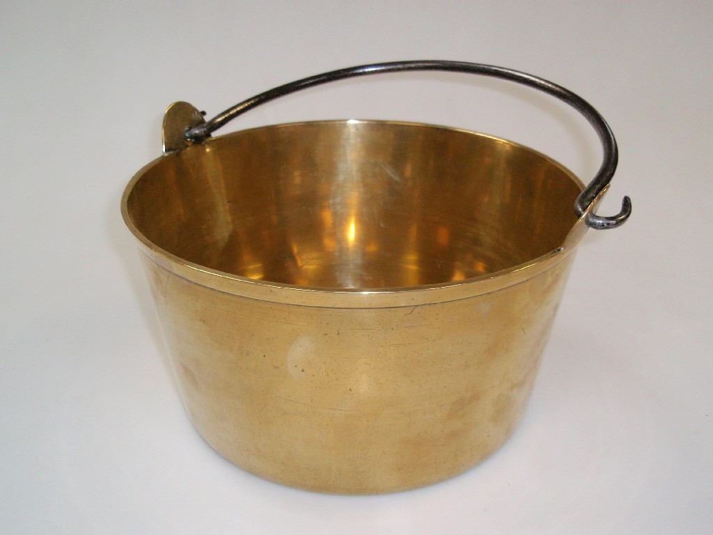 Appraisal: Heavy gauge brass preserve pan with iron swing handle