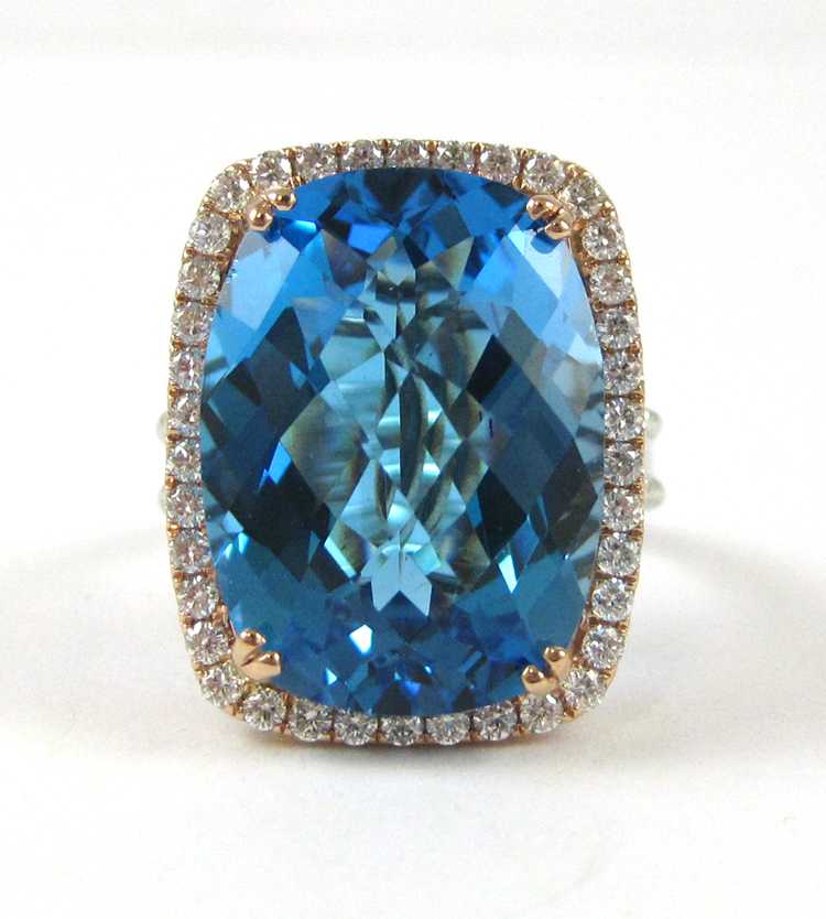 Appraisal: BLUE TOPAZ DIAMOND AND FOURTEEN KARAT GOLD RING The rose