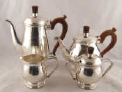 Appraisal: A modern four piece hand raised silver tea and coffee