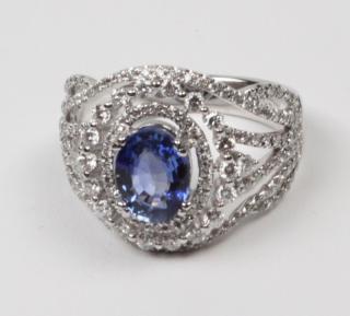 Appraisal: K WHITE GOLD DIAMOND AND BLUE SAPPHIRE LADY'S RING HAVING