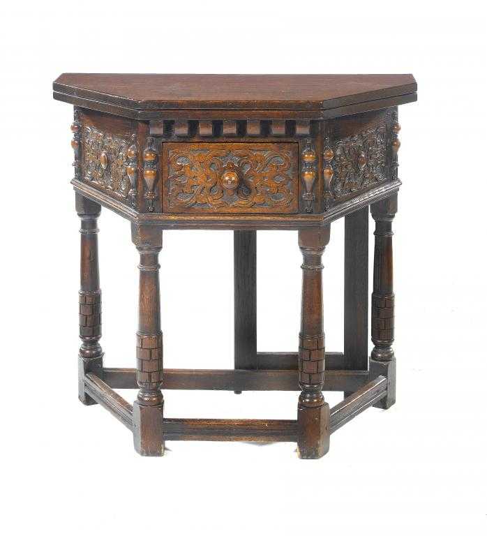 Appraisal: A CHARLES II STYLE OAK CREDENCE TABLE the folding top