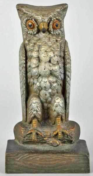 Appraisal: Cast Iron Owl on Log Doorstop Description Marked B G